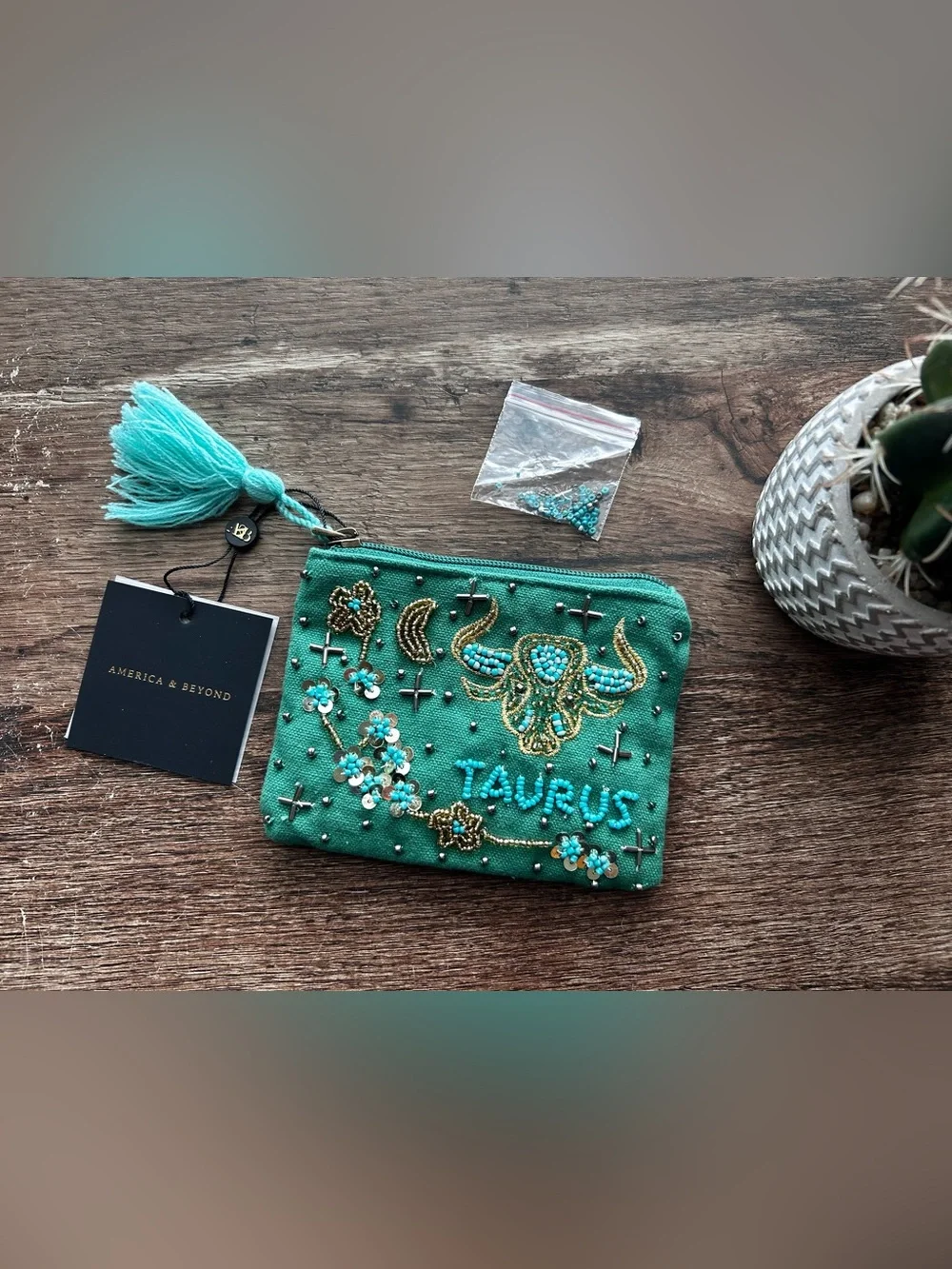 America & Beyond Taurus Beaded Wristlet in Teal - Picture 1 of 3